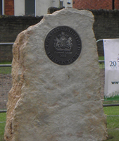 Plaque set in stone